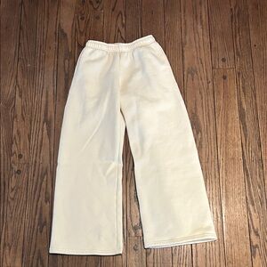 Edikted Butter Yellow Wide Leg Sweatpants with Pink Bows on Back